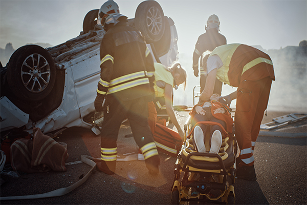 car crash injury with paramedics on site