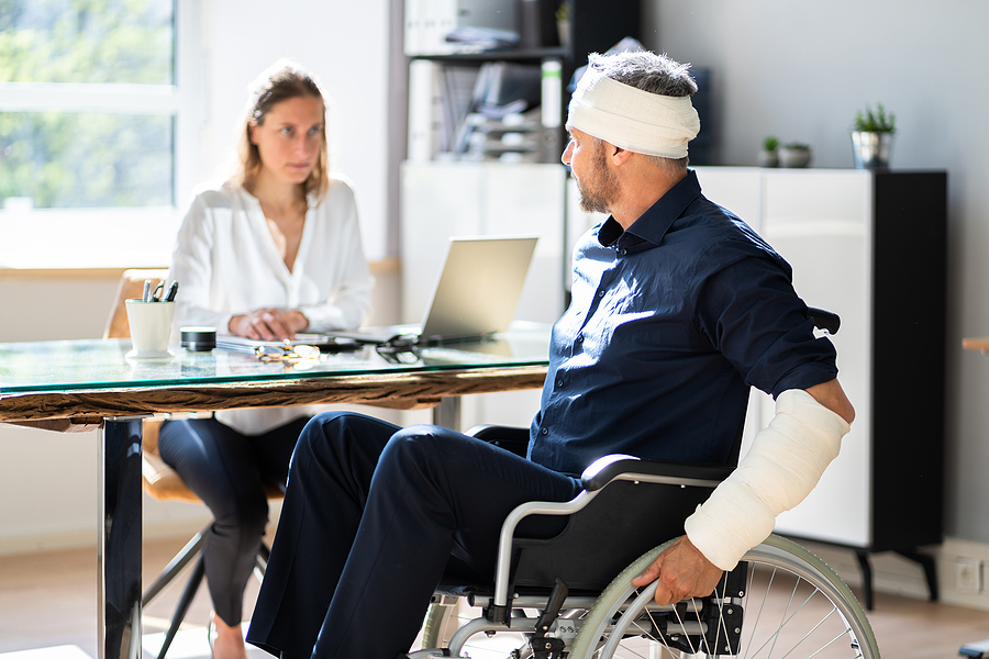 lawyer talking with a patient that was injured at an apartment complex